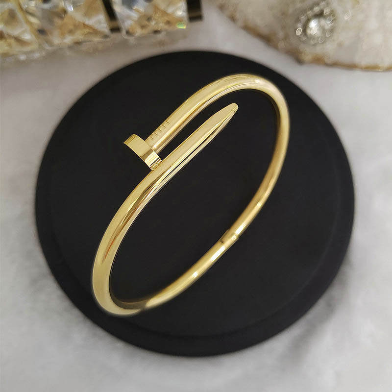 Gold nail bracelet